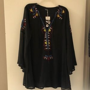 Black blouse with sheer sleeves